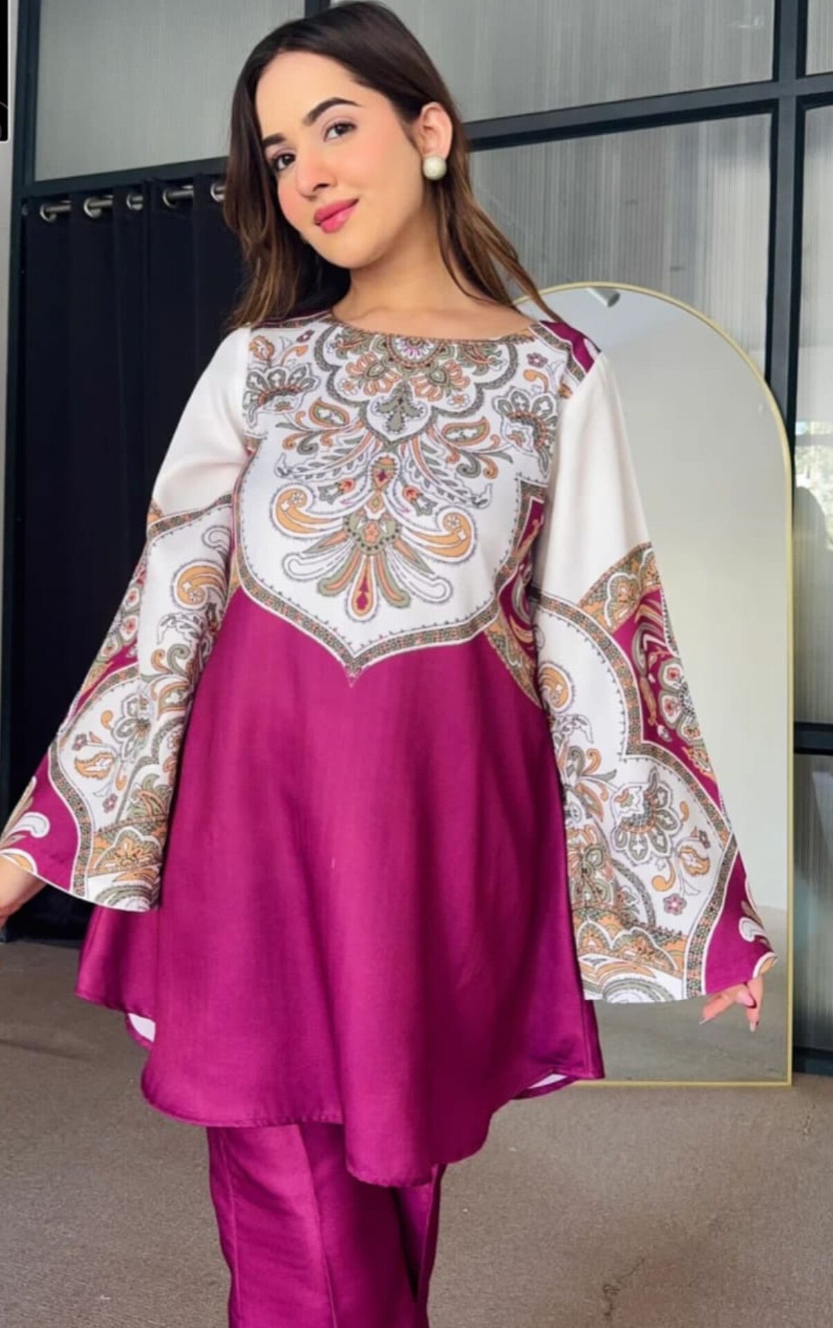 Flared peplum top and trouser set